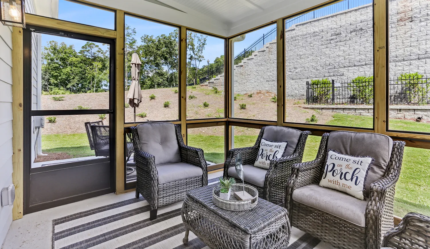 Screen porch in a new home at Lakeside at Great Sky community in Canton, Georgia