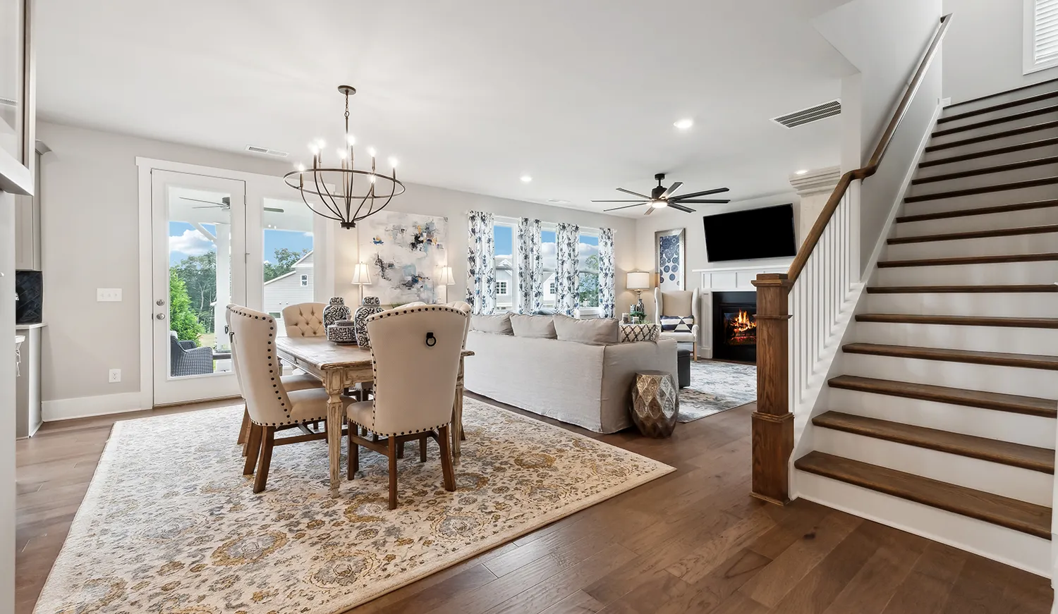 Open concept dining room and living room in a new home at Willow Cove community in Canton, Georgia